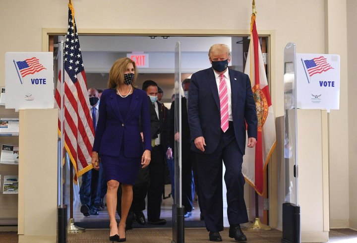 	US President Donald Trump leaves the polling station after casting his ballot at the Palm Beach County Public Library, during early voting for the November 3 election, in West Palm Beach, Florida, on October 24, 2020. (Photo by MANDEL NGAN / AFP)