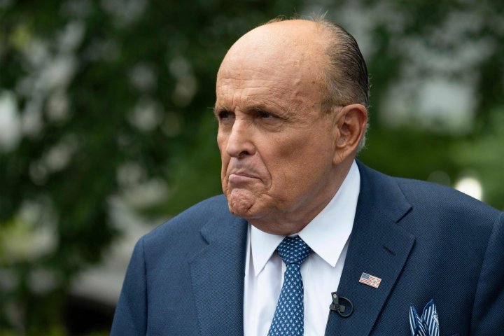  In this file photo taken on July 01, 2020 Rudy Giuliani, attorney for US President Donald Trump, speaks at the White House in Washington, DC. - Donald Trump on December 6, 2020 tweeted that his personal lawyer Rudy Giuliani, who has led the president's effort to undo his election loss, tested positive for Covid-19. (Photo by JIM WATSON / AFP)