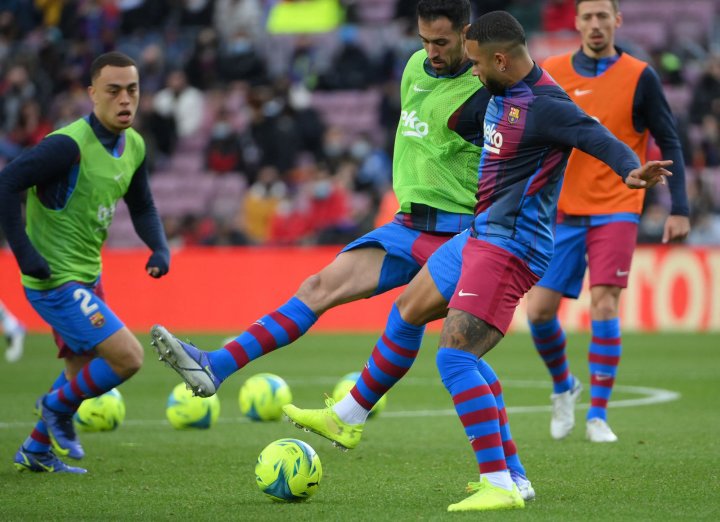 Barcelona players warm up ahead of Betis clash
