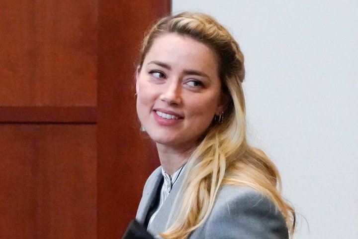 Actor Amber Heard leaves during a break in the courtroom during closing arguments during her ex-husband Johnny Depp's defamation case against her at the Fairfax County Circuit Courthouse in Fairfax, Virginia, U.S., May 27, 2022. Steve Helber/Pool via REUTERS