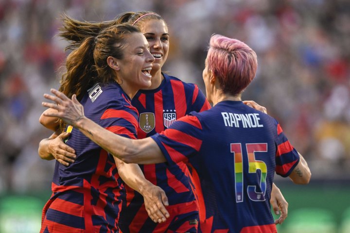 Sofia Huerta #8, Alex Morgan #13 and Megan Rapinoe #15 of the United States celebrate a goal during a game against Columbia at Rio Tinto Stadium on June 28, 2022 in Sandy, Utah.   Alex Goodlett/Getty Images/AFP== FOR NEWSPAPERS, INTERNET, TELCOS & TELEVISION USE ONLY ==
