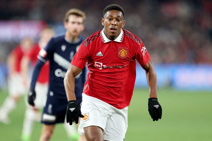 Anthony Martial of Manchester United runs for the ball during the exhibition football match between English Premier League team Manchester United and Melbourne Victory at the Melbourne Cricket Ground on July 15, 2022, in Melbourne. (Photo by George SALPIGTIDIS / AFP) / IMAGE RESTRICTED TO EDITORIAL USE - STRICTLY NO COMMERCIAL USE