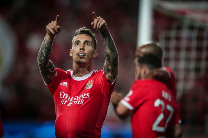 Benfica's Spanish defender Alex Grimaldo celebrates after scoring his team's second goal during the UEFA Champions League Group H first-leg football match between SL Benfica and Maccabi Haifa at the Luz stadium in Lisbon on September 6, 2022. (Photo by CARLOS COSTA / AFP)
