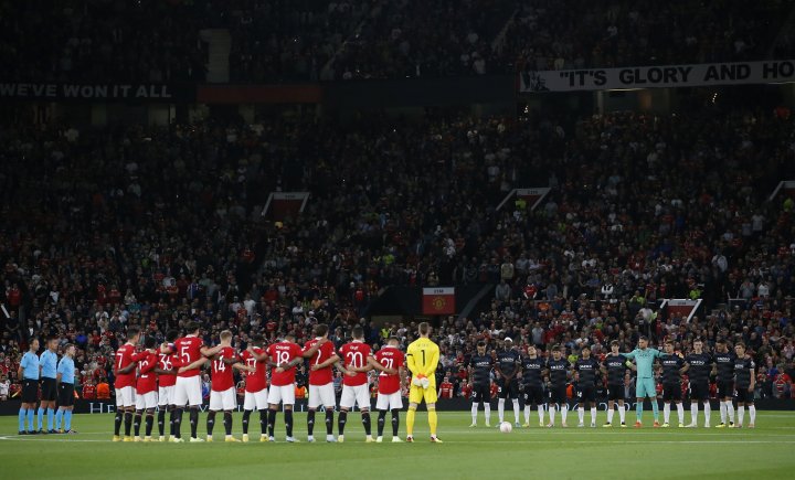 Soccer Football - Europa League - Group E - Manchester United v Real Sociedad - Old Trafford, Manchester, Britain - September 8, 2022 Players during a minutes silence after the death of Britain's Queen Elizabeth before the match REUTERS/Craig Brough