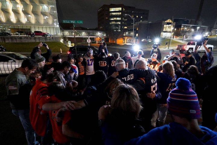 Fans gather outside the University of Cincinnati Medical Center