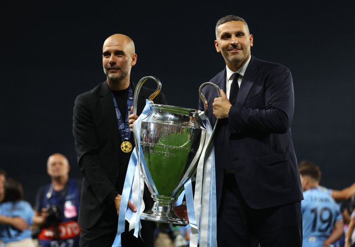 Inter Milan's Alessandro Bastoni, left, heads the ball past Manchester  City's Erling Haaland during the Champions League final soccer match  between Manchester City and Inter Milan at the Ataturk Olympic Stadium in