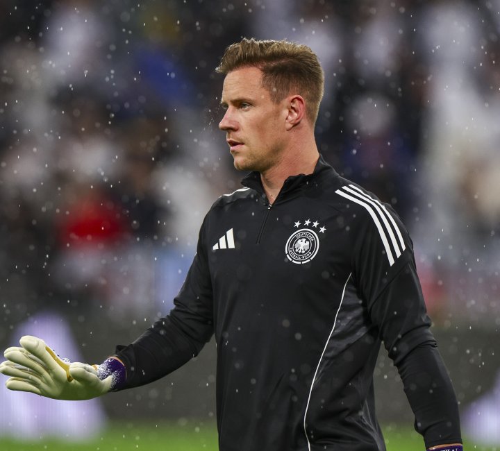 Germany's goalkeeper #01 Marc-Andre Ter Stegen warms up during a hail shower prior to the UEFA Nations League semi-final football match between Germany and Portugal in Munich, southern Germany on June 4, 2025. (Photo by Alexandra BEIER / AFP)
